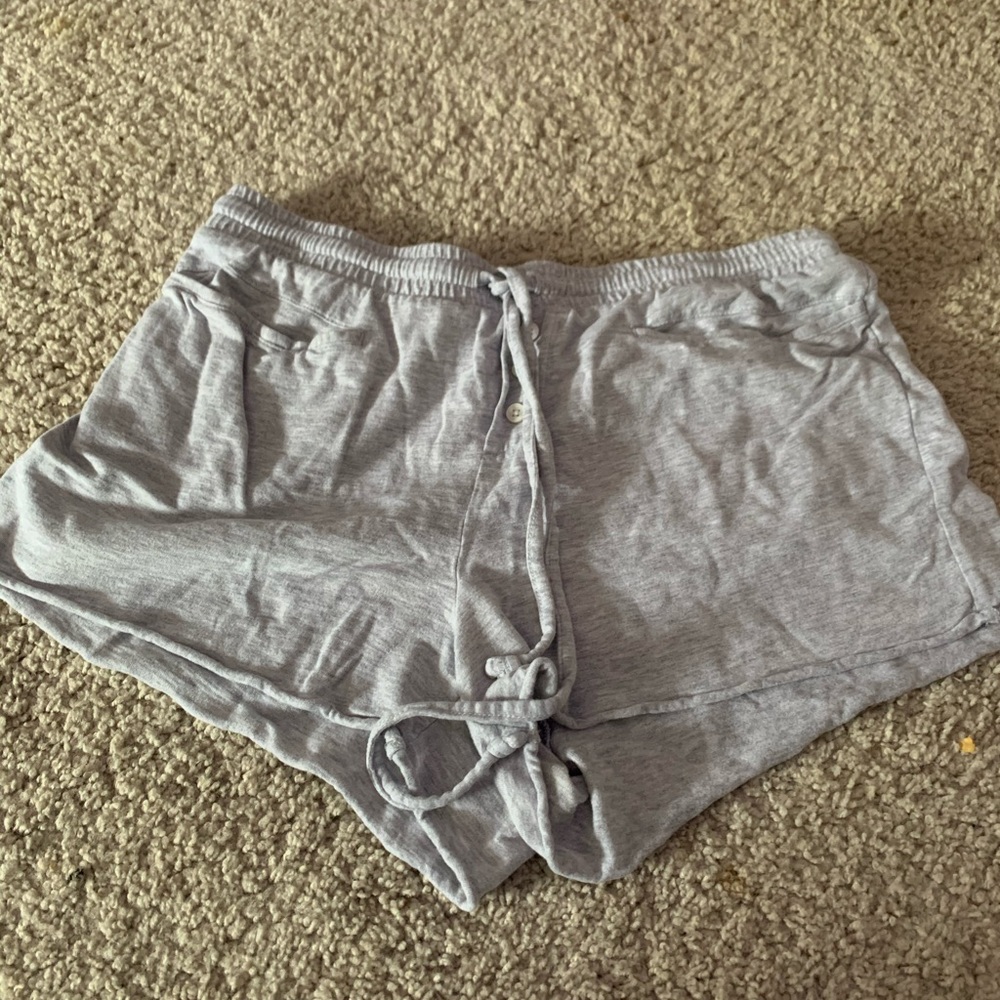 grey shorts with buttons and string